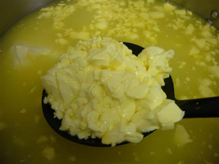 Scooping out curd
